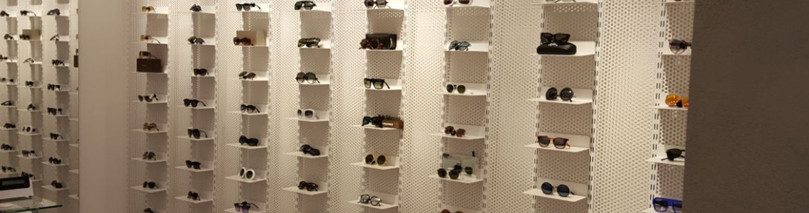 Metal Furniture Eyeglass Store - Arredamento negozi franchising lavorazione acciaio inox su misura
